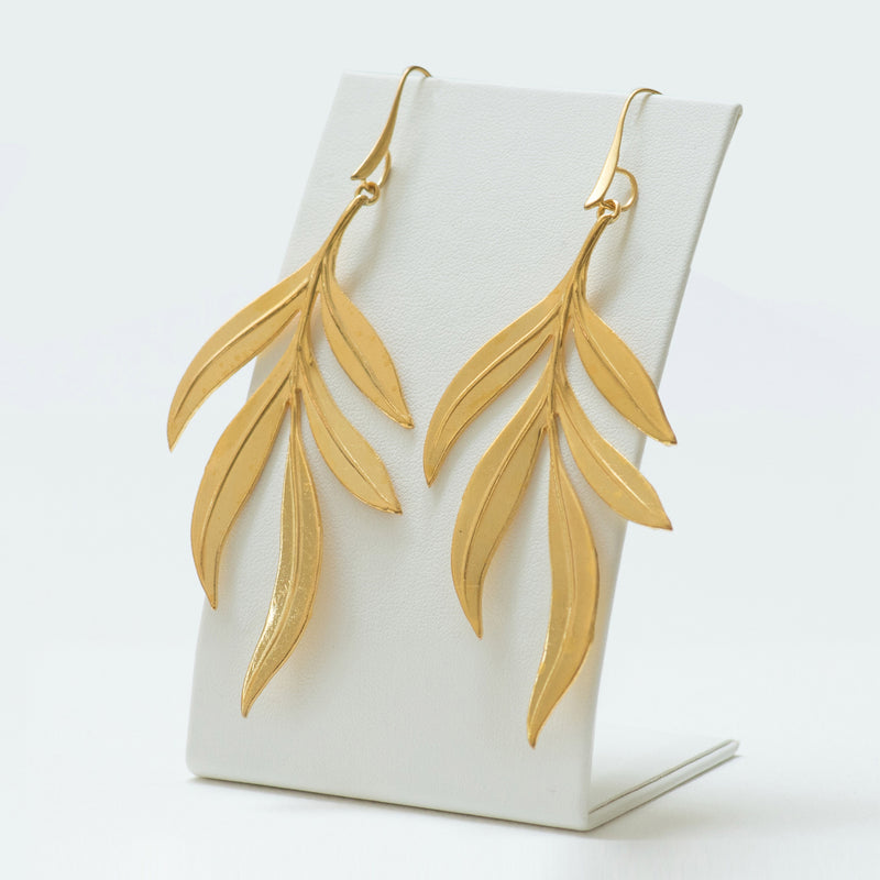 NOELIE gold metal leaves earrings