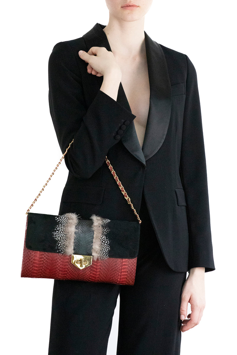 COCOTTE clutch red and black with a shoulder strap